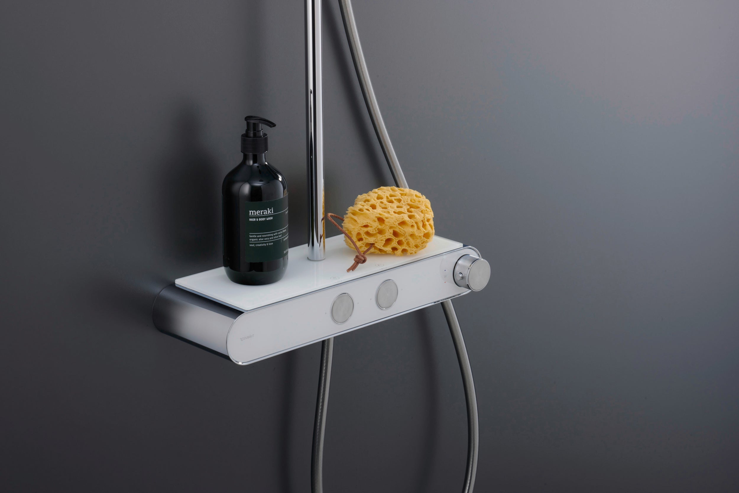 Sistema doccia Duravit con termostato e ripiano in vetro